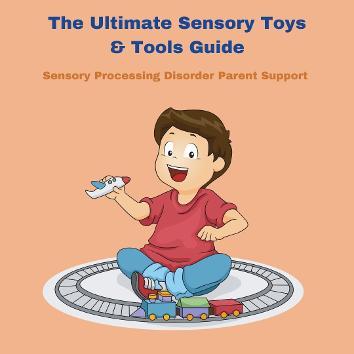 boy playing with toy train The Ultimate Sensory Toys & Tools Guide 